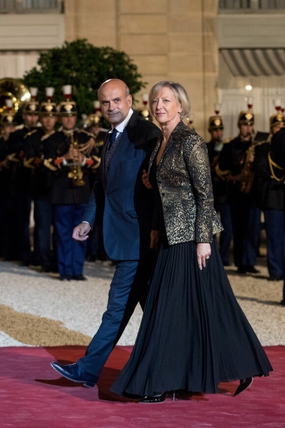 Sophie Cluzel, secrétaire d'Etat, chargée des Personnes handicapées avec son mari Bruno - Le président de la République française et sa femme la Première reçoivent le président de la République de Corée du Sud et sa femme pour un diner d'Etat au palais de l'Elysée à Paris, France, le 15 octobre 2018. © Cyril Moreau/Bestimage