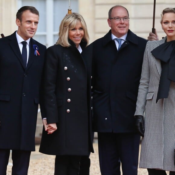 Le président de la République Emmanuel Macron et sa femme la Première Dame Brigitte Macron ont accueilli le 11 novembre 2018 le prince Albert II de Monaco et la princesse Charlene à l'Elysée dans le cadre des commémorations du centenaire de l'armistice de la Première Guerre mondiale. © Stéphane Lemouton/Bestimage