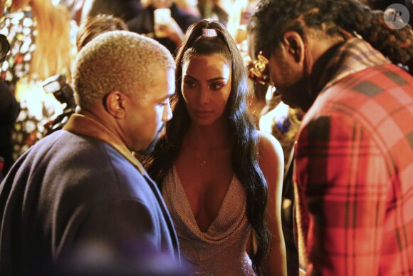 Kim Kardashian, son mari Kanye West et 2 Chainz - Défilé Versace (pré-collection automne 2019) à l'American Stock Exchange à New York, le 2 décembre 2018.