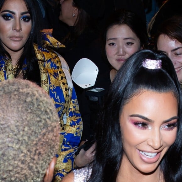 Kim Kardashian, Kanye West, 2 Chainz et Kesha Ward assistent au défilé Versace (pré-collection automne 2019) à l'American Stock Exchange à New York, le 2 décembre 2018.