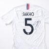 Mamadou Sakho met en vente l'un de ses maillots de l'équipe de France pour la vente aux enchères en faveur de son association AMSAK - Agir pour les autres, avec Vestiaire Collective, le 9 décembre 2018.