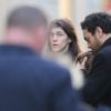 Charlotte Gainsbourg et Roman de Kermadec (Fils de Kate Barry) serrant dans ses bras Marlowe (fils de Lou Doillon) - Sortie des obsèques de Kate Barry en l'église Saint-Roch à Paris. Le 19 décembre 2013