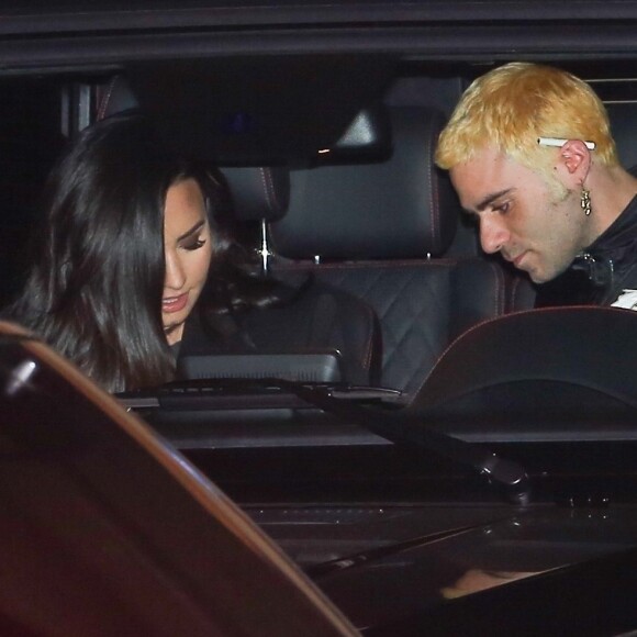 Demi Lovato et son nouveau compagnon Henry Levy quittent le restaurant Nobu à Malibu le 9 décembre 2018.