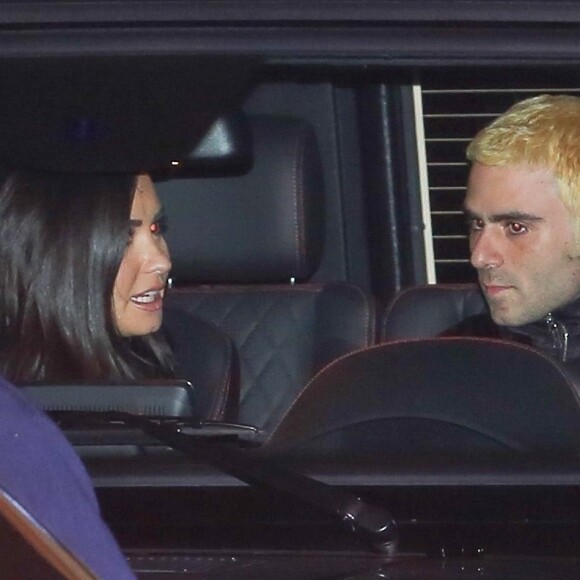 Demi Lovato et son nouveau compagnon Henry Levy quittent le restaurant Nobu à Malibu le 9 décembre 2018.
