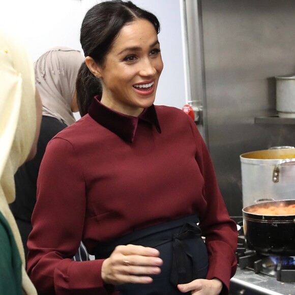 Meghan Markle (enceinte), duchesse de Sussex, rend visite à la Hubb Community Kitchen à Londres le 21 novembre 2018.