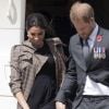Le prince Harry et Meghan Markle (en robe ASOS) arrivent à Wellington, en Nouvelle-Zélande, le 28 octobre 2018.
