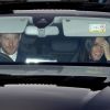 Le prince Harry et la duchesse Meghan de Sussex (Meghan Markle), enceinte et en robe Erdem, en voiture au palais de Buckingham à Londres le 19 décembre 2018 pour le traditionnel déjeuner de Noël anticipé organisé par la reine Elizabeth II.