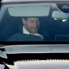 Le prince Harry et la duchesse Meghan de Sussex (Meghan Markle), enceinte et en robe Erdem, en voiture au palais de Buckingham à Londres le 19 décembre 2018 pour le traditionnel déjeuner de Noël anticipé organisé par la reine Elizabeth II.