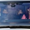 Kate Middleton, duchesse de Cambridge, et le prince William en voiture avec leurs enfants au palais de Buckingham à Londres le 19 décembre 2018 pour le traditionnel déjeuner de Noël anticipé organisé par la reine Elizabeth II.