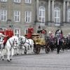 La reine Margrethe II de Danemark arrive dans son carrosse doré au palais de Christiansborg à Copenhague le 4 janvier 2019 pour la dernière des réceptions du Nouvel An.