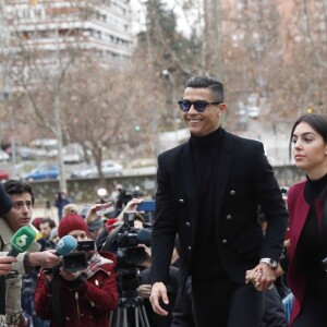 Cristiano Ronaldo se rend au tribunal pour fraude fiscale avec sa compagne Georgina Rodríguez à Madrid en Espagne le 22 janvier 2019.