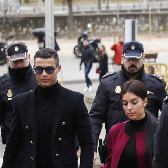 Cristiano Ronaldo se rend au tribunal pour fraude fiscale avec sa compagne Georgina Rodríguez à Madrid en Espagne le 22 janvier 2019.