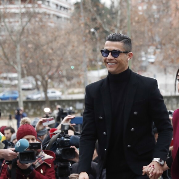 Cristiano Ronaldo se rend au tribunal pour fraude fiscale avec sa compagne Georgina Rodríguez à Madrid en Espagne le 22 janvier 2019.