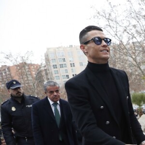 Cristiano Ronaldo se rend au tribunal pour fraude fiscale avec sa compagne Georgina Rodríguez à Madrid en Espagne le 22 janvier 2019.