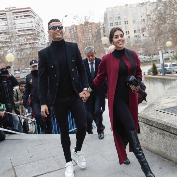 Cristiano Ronaldo se rend au tribunal pour fraude fiscale avec sa compagne Georgina Rodríguez à Madrid en Espagne le 22 janvier 2019.