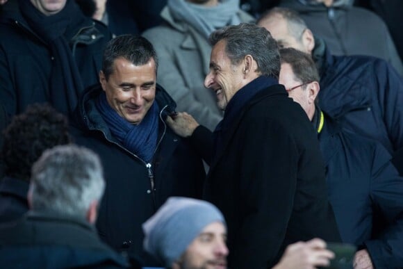 Nicolas Sarkozy dans les tribunes du Parc des Princes lors du match de Coupe du France "PSG - Strasbourg (2-0)" à Paris, le 23 janvier 2019.