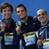 Nathan Adrian, médaille d'argent, Florent Manaudou, médaillé d'or et Bruno Fratus, médaille de bronze du 50m nage libre lors des Championnats du monde de natation à Kazan en Russie. Le 8 août 2015