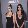 Kourtney Kardashian, Kim Kardashian au photocall de la 21ème édition du "amfAR Gala" au profit de la recherche contre le SIDA au Cipriani Wall Street à New York, le 6 février 2018.