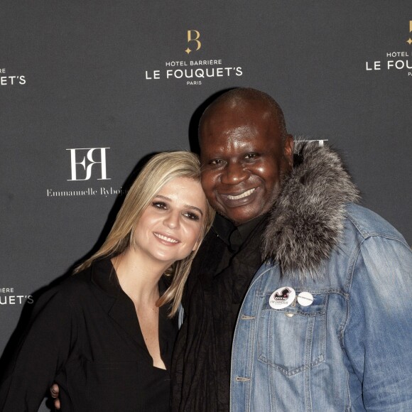 Semi Exclusif - Emmanuelle Rybojad et Magloire lors du vernissage de l'exposition de Emmanuelle Rybojad au Fouquet's à Paris le 7 février 2019.