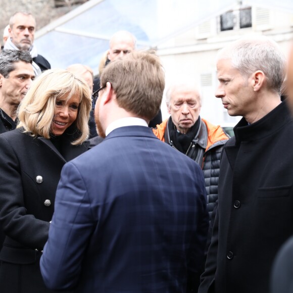 La première dame Brigitte Macron et le ministre de la Culture Franck Riester - Sorties des obsèques de Michel Legrand en la cathédrale orthodoxe Saint-Alexandre-Nevsky à Paris le 1er février 2019.
