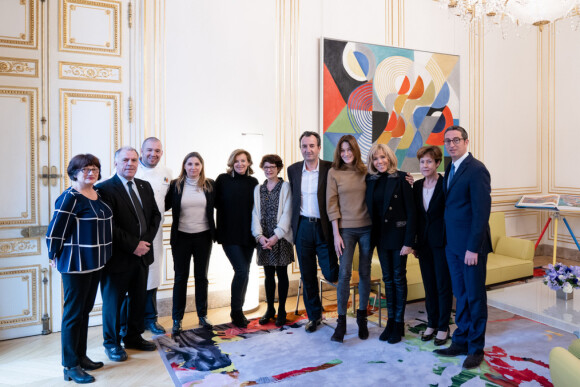 Brigitte Macron et les anciennes premières dames Carla Bruni-Sarkozy et Valérie Trierweiler après un déjeuner au palais de l'Elysée à Paris le 24 janvier 2019.