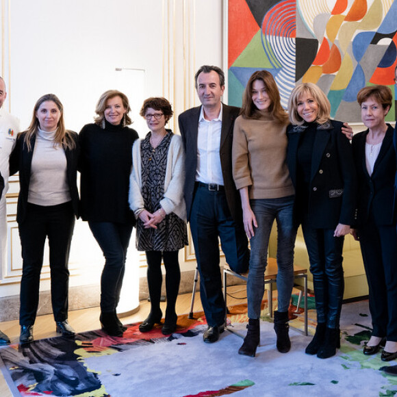 Brigitte Macron et les anciennes premières dames Carla Bruni-Sarkozy et Valérie Trierweiler après un déjeuner au palais de l'Elysée à Paris le 24 janvier 2019.