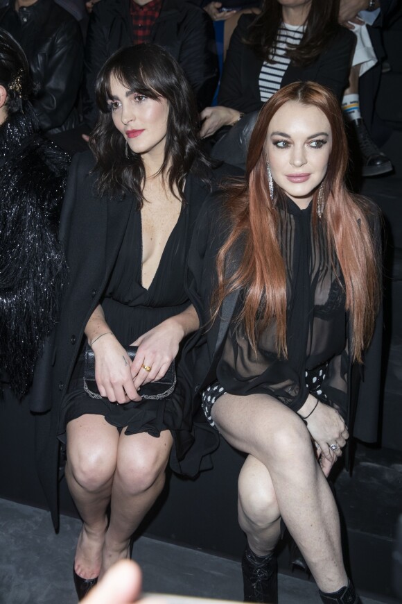 Lindsay Lohan et sa soeur Aliana lors du Front Row du défilé de mode prêt-à-porter automne-hiver 2019/2020 « Saint Laurent » à Paris le 26 février 2019. © Olivier Borde / Bestimage