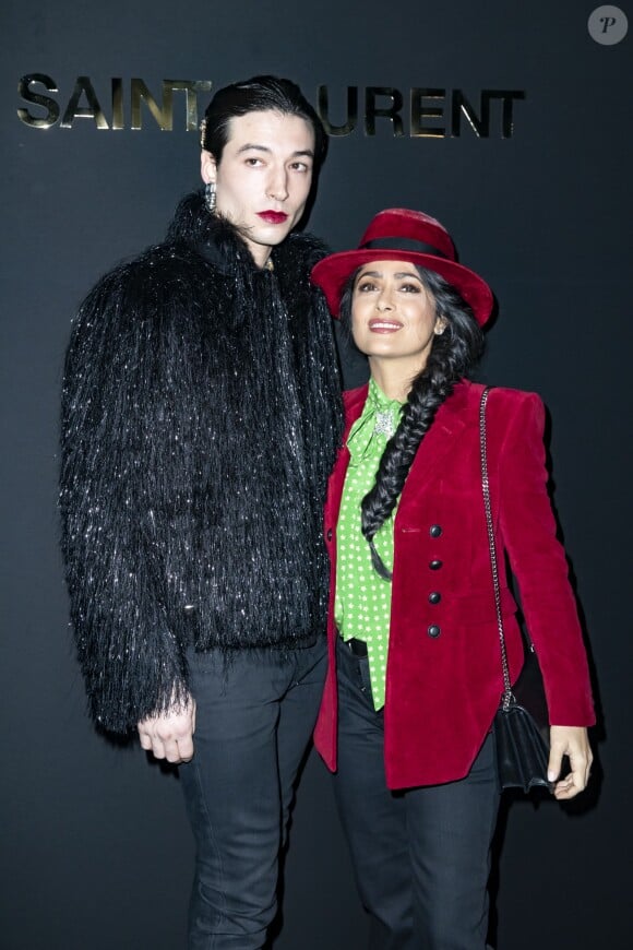 Ezra Miller et Salma Hayek au Photocall du défilé de mode Prêt-à-Porter automne-hiver 2019/2020 « Saint Laurent » à Paris. Le 26 février 2019 © Olivier Borde / Bestimage
