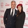 David Ginola et sa compagne Maeva Denat arrivent à la soirée "The Beating Hearts Ball" à Londres, le 27 février 2019.