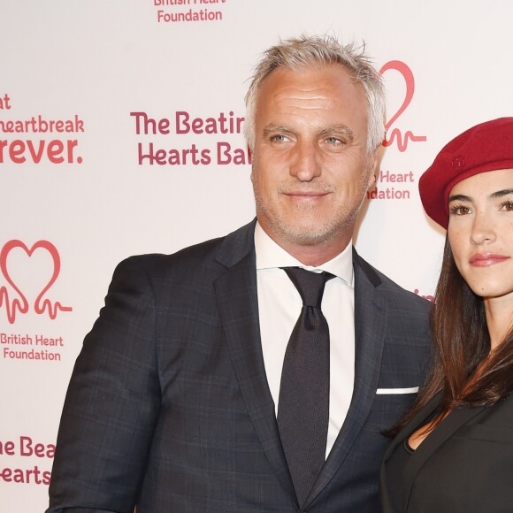 David Ginola et sa compagne Maeva Denat arrivent à la soirée "The Beating Hearts Ball" à Londres, le 27 février 2019.