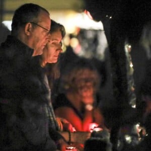 Jean Reno et sa femme Zofia Borucka - Laeticia Hallyday, ses filles Jade et Joy, Jean Reno et sa femme Zofia ainsi que Charlotte Gainsbourg en famille se recueillent sur la tombe de J. Hallyday au cimetière de Lorient à Saint-Barthélemy, le 19 février 2019.