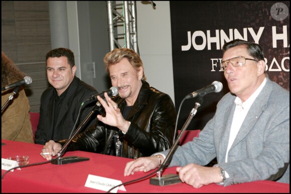 Thierry Chassagne, Johnny Hallyday et Jean-Claude Camus - Conférence de presse pour la tournée "Flashback Tour", à Bercy, le 31 mai 2006.