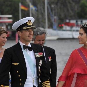 La princesse Mary et le prince Frederik de Danemark au mariage de la princesse Madeleine de Suede avec Chris O'Neill à Stockholm en Suède le 8 juin 2013.