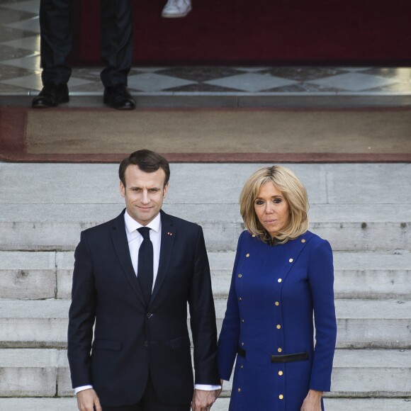 Le président Emmanuel Macron, la première dame Brigitte Macron raccompagnent le président de la République populaire de Chine Xi Jinping et sa femme Peng Liyuan à l'issue de la visite d'Etat de 2 jours qui s'achève par un entretien au palais de l'Elysée à Paris le 26 mars 2019. © Eliot Blondet / Pool / Bestimage