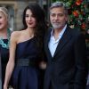 George Clooney et sa femme Amal arrivent à l'événement "Postcode Lottery Charity Gala" au McEwan hall à Edimbourg le 14 mars 2019.
