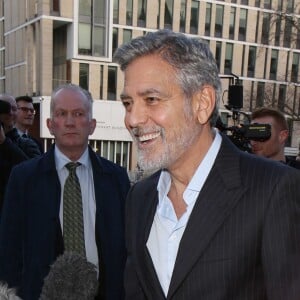 George Clooney et sa femme Amal arrivent à l'événement "Postcode Lottery Charity Gala" au McEwan hall à Edimbourg le 14 mars 2019.