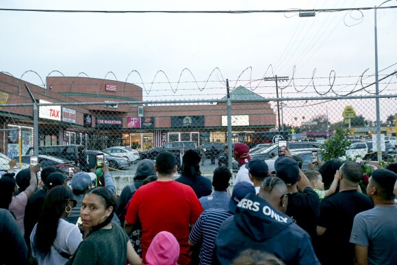 Rassemblement devant le magasin de vêtements The Marathon Clothing, où le rappeur et fondateur de la marque, Nipsey Hussle, a été assassiné. Los Angeles, le 31 mars 2019.