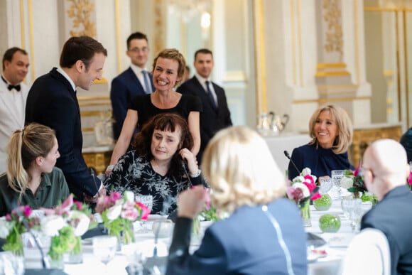 Emmanuel et Brigitte Macron - Rencontre avec Sandrine Bonnaire, sa fille aînée Jeanne et sa soeur Sabine Bonnaire à l'Elysée, le 8 mars 2019.