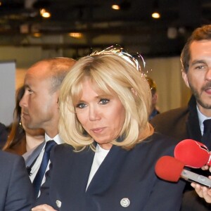 La Première Dame Brigitte Macron, avec son directeur de cabinet Pierre-Olivier Costa et le secrétaire d'État auprès de la ministre des Solidarités et de la Santé, Adrien Taquet lors au "Grand débat national pour les enfants", à la Cité des sciences et de l'industrie à Paris, France, le 20 mars 2019.