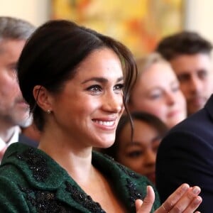 Meghan Markle, enceinte, duchesse de Sussex, lors de sa visite à Canada House dans le cadre d'une cérémonie pour la Journée du Commonwealth à Londres le 11 mars 2019.