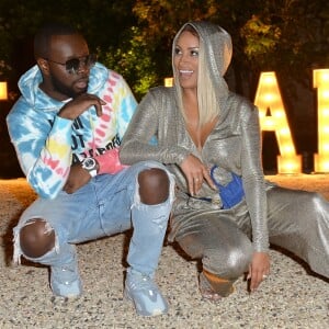 Maître Gims (Gandhi Djuna) et sa femme Demdem Djuna lors de la soirée de lancement de la collection capsule "I'm not a rapper" de la marque Elevenparis (Eleven Paris) à Paris, France, le 11 avril 2019. © Veeren/Bestimage