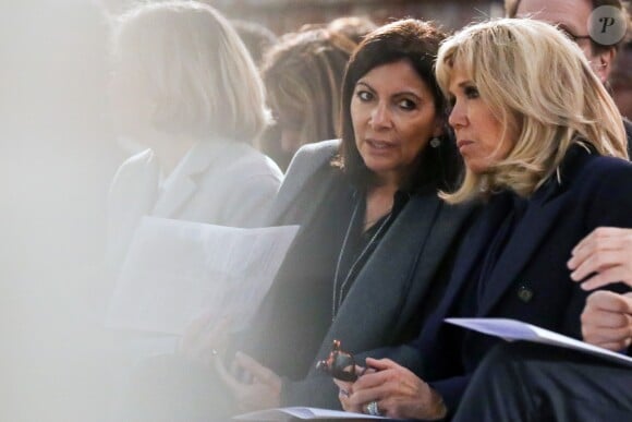 Anne Hidalgo, maire de Paris, la première dame Brigitte Macron lors de la la messe chrismale dans l'église Saint-Sulpice à Paris au lieu de Notre-Dame le 17 avril 2019. © Stéphane Lemouton / Bestimage
