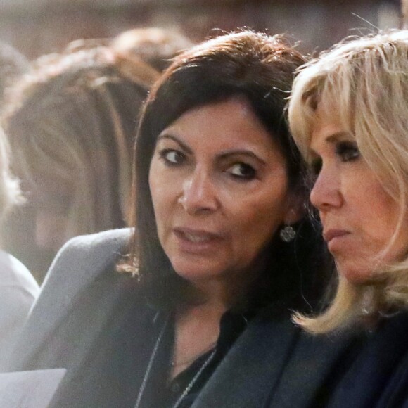 Anne Hidalgo, maire de Paris, la première dame Brigitte Macron lors de la la messe chrismale dans l'église Saint-Sulpice à Paris au lieu de Notre-Dame le 17 avril 2019. © Stéphane Lemouton / Bestimage