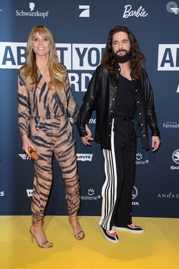 Heidi Klum et son fiancé Tom Kaulitz au photocall de la soirée des "About You Awards 2019" aux Bavaria Studios à Munich, le 18 avril 2019.