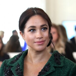 Meghan Markle la duchesse de Sussex enceinte et le prince Harry, duc de Sussex, assistent à une activité jeunesse le Jour du Commonwealth à la Maison du Canada le 11 mars 2019.