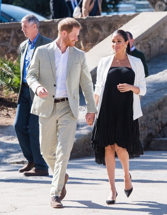 Le prince Harry, duc de Sussex et Meghan Markle, duchesse de Sussex, enceinte, en visite au "Andalusian Gardens" à Rabat lors de leur voyage officiel au Maroc, le 25 février 2019.