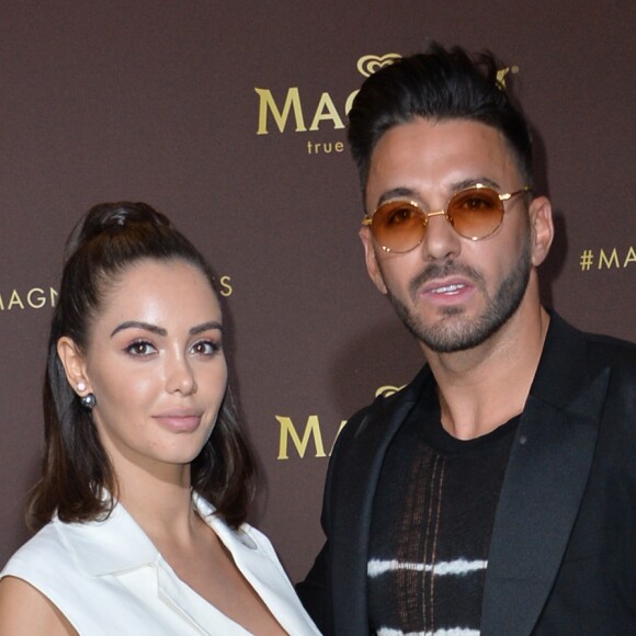 Nabilla Benattia (enceinte) et son mari Thomas Vergara au photocall de l'after party "Magnum x Rita Ora" sur la plage privé Magnum lors du 72ème Festival International du Film de Cannes, France,le 16 mai 2019. © Veeren/Bestimage