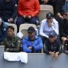 Le coach de Dominic Thiem, Nicola Massu, et la compagne du tennisman autrichien, Kristina Mladenovic, assistent au match Novak Djokovic - Dominic Thiem à Roland Garros. Paris, France, le 8 juin 2019.