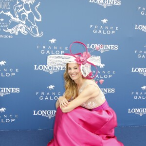 Sophie Thalmann (robe Christophe Guillarmé) et son fils Robin Soumillon au Prix de Diane Longines à l'hippodrome de Chantilly, le 16 juin 2019. © Marc Ausset-Lacroix/Bestimage