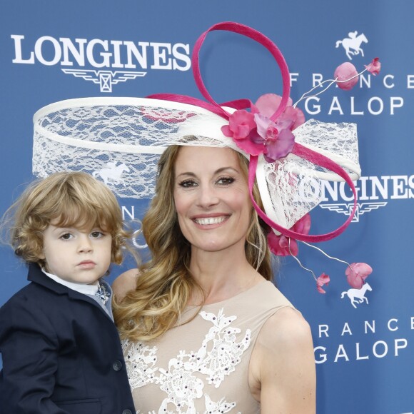 Sophie Thalmann (robe Christophe Guillarmé) et son fils Robin Soumillon au Prix de Diane Longines à l'hippodrome de Chantilly, le 16 juin 2019. © Marc Ausset-Lacroix/Bestimage